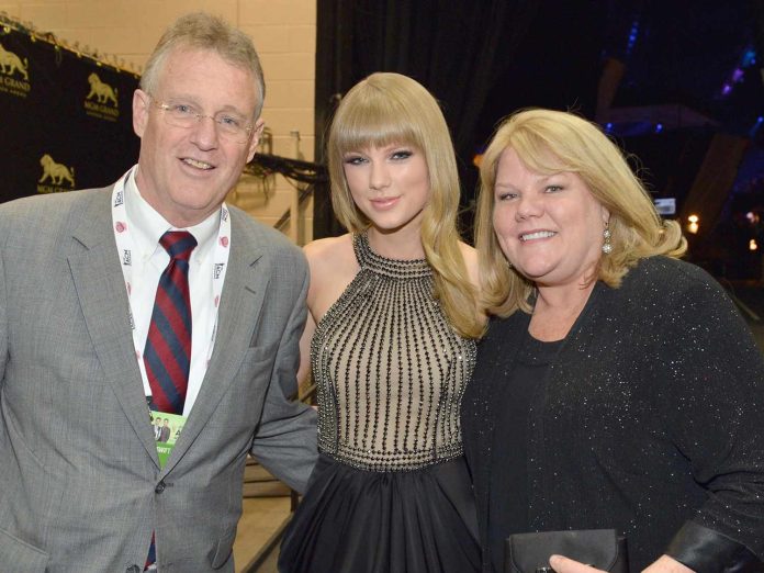 Taylor Swift with her parents Scott Swift and Andrea Swift